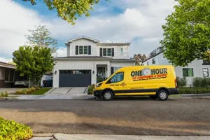 One Hour Air Conditioning Logo Van outside of a home in Brandenton