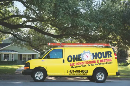 One Hour Air Conditioning Van Facing left outside of Home in Bradenton